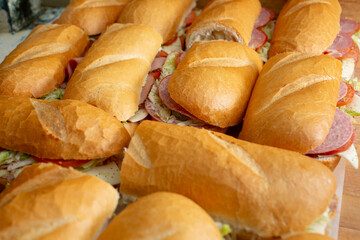 A view of several half sandwiches.