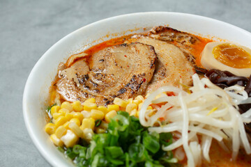 A view of a tonkatsu red ramen bowl.