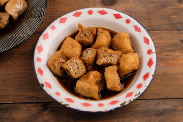 Tahu gejrot is a typical food from Cirebon, West Java, Indonesia, made from tofu that has been fried and then eaten with a sauce consisting of chili, garlic, shallots and sugar. Indonesian food