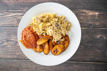 Plantain and Eggs with pepper tomato sauce ready to eat