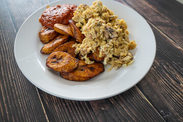 Plantain and Eggs with pepper tomato sauce ready to eat