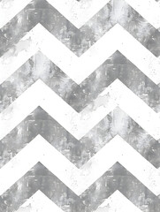 A chevron patterned wall with a grey and white color scheme