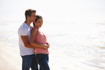 Couple, beach and hug in relax with love for embrace, care or support on outdoor holiday or...