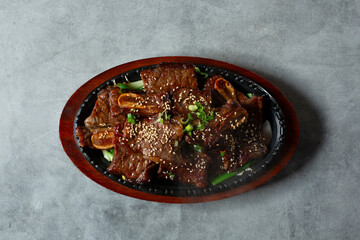 A top down view of an entree of galbi.