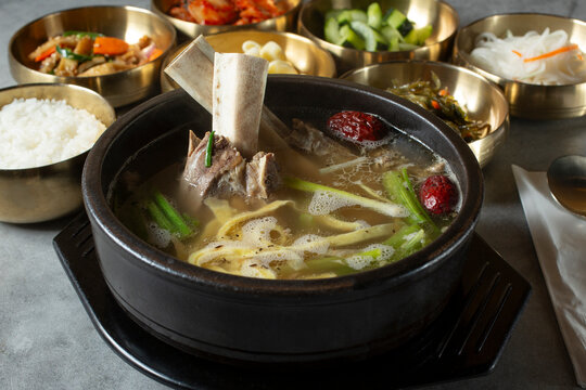 A view of a bowl of bone-in beef short rib soup.