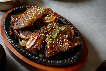 A closeup view of entree of beef galbi.