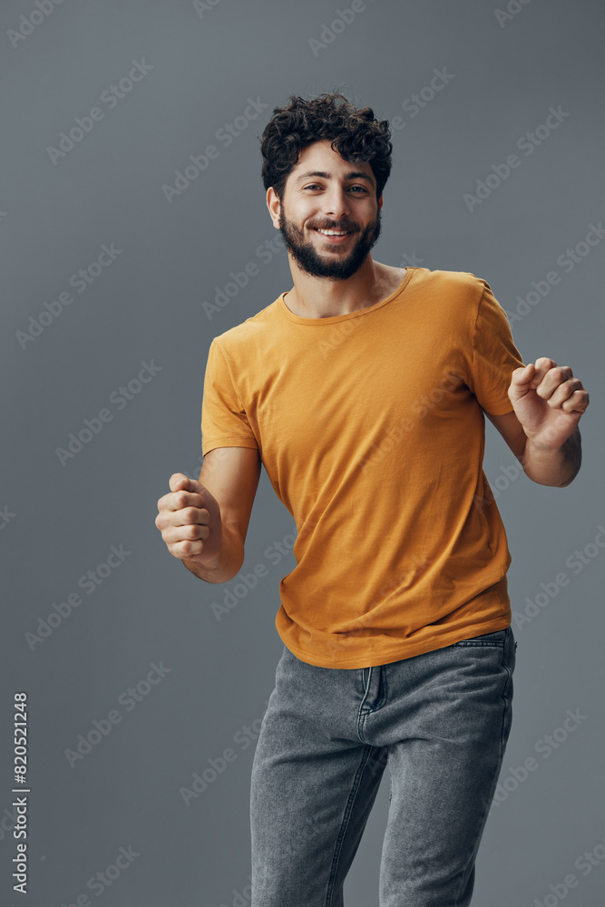 Wall mural Adult cheerful guy portrait young handsome studio background men person happy expression success