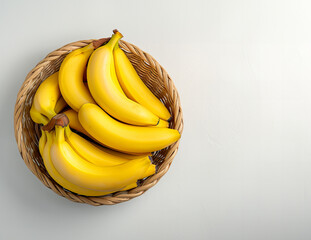 bananas in a straw basket with leaf isolated on white background top view flat lay © onehourhappiness