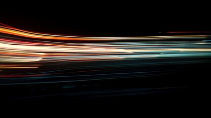 Abstract blurred light lines on black background. Light trails against dark background.