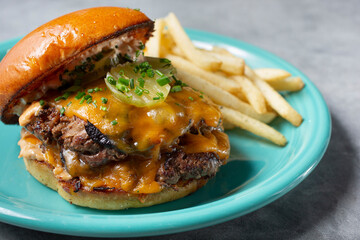 A view of a double patty cheeseburger.