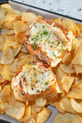 A top down view of a meatball sandwich.