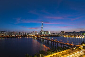 skyline of seoul by Han River in south korea at night