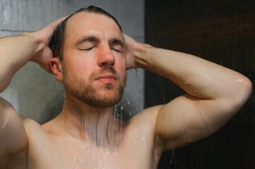 Man warming up in the shower