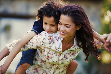 Piggy back, outdoor and mother with boy, smile and bonding together with happiness, relax and...