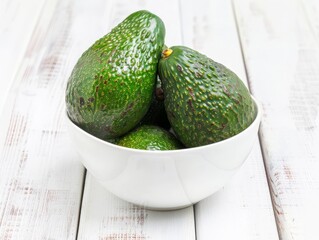 Ripe Avocados in a Bowl: A Fresh and Healthy Start