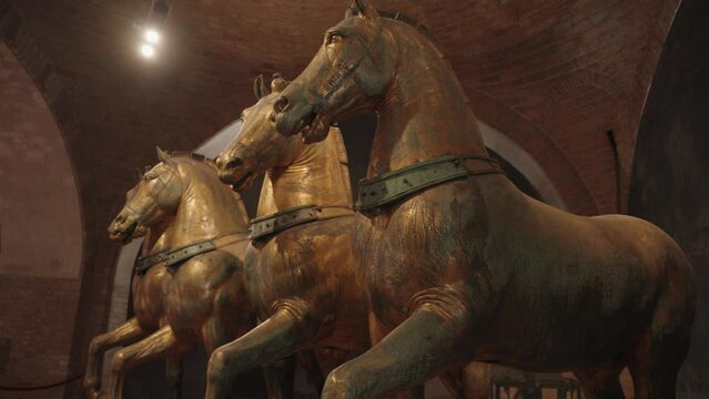 Venice, Italy - The Triumphal Quadriga is the group of bronze four horses at St. Mark's Basilica, Venice.