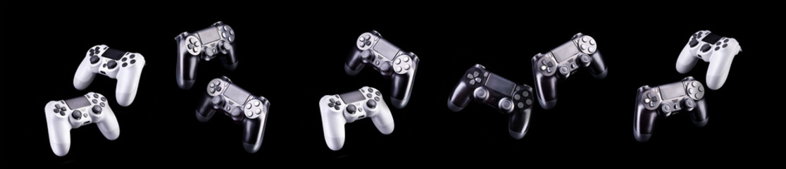 Set of video game joysticks gamepad isolated on a black background