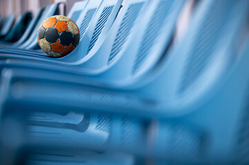 A handball ball on a chair