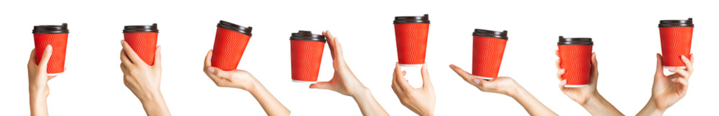Woman hand holding coffee paper drinking cup