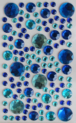 Variety Size Blue Artificial Crystals On White Surface Stock Photo For Decoration Backgrounds
