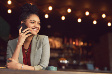 Happy woman, night and phone call at cafe for business discussion, proposal or chatting at...