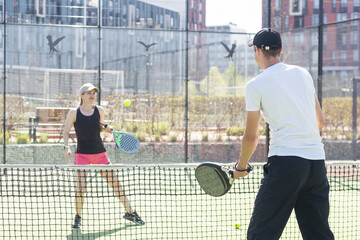  paddle tennis couple players ready for class