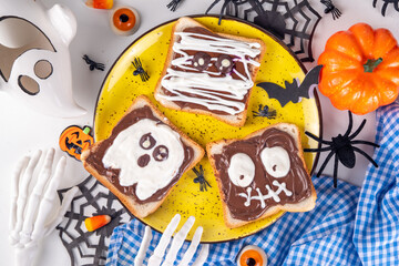 Funny Halloween characters toasts with nuts butter