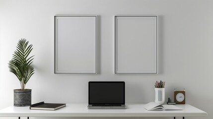 A minimalist office space with two white frames on a clean white wall, a simple desk with a laptop, and modern office accessories,
