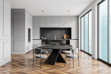 Classical home kitchen interior with eating table and bar island with window