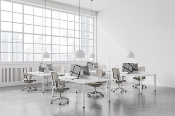 Modern office interior with coworking space and panoramic window