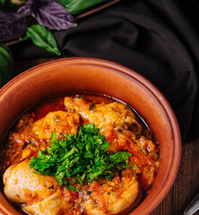 Hearty chicken stew in ceramic bowl