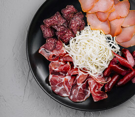 Assorted deli meats and cheese platter