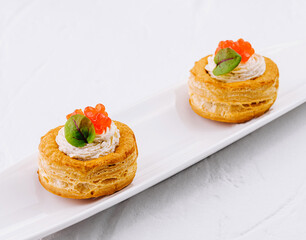 Gourmet vol-au-vent appetizers with salmon caviar