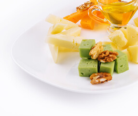 Cheese Platter with Honey, Nuts on white