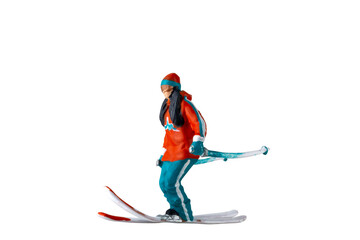 Fototapeta premium Miniature people , A skier full length Isolated with clipping path