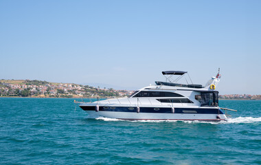 Side view of a motorboat sailing on the sea in Ayvalık, Turkey.