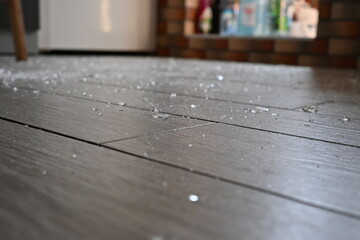 shards of broken crockery on the grey floor, broken crockery on the floor