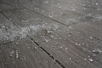 shards of broken crockery on the grey floor, broken crockery on the floor