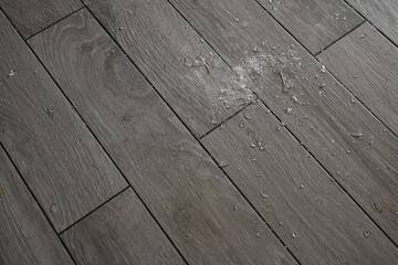 shards of broken crockery on the grey floor, broken crockery on the floor