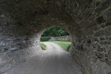 Medieval stone tunnel path view