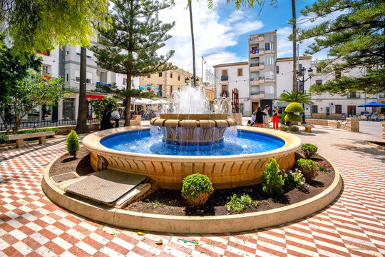Benissa ,Spain, Costa Blanca. Fountain in Placa del Rei Jaume I near the cathedral in the historic centre of Benissa
