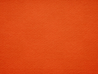 The fiery orange felt surface ignites the senses, suggesting a bold and energetic essence with a hint of playful warmth