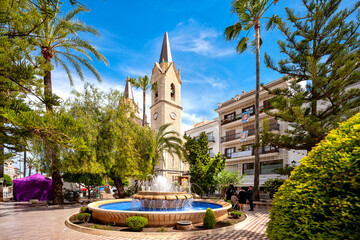 Benissa ,Spain, Costa Blanca. Cathedral Purissima Xiqueta and, fountain in the historic centre of...