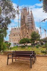 A bench without people in the Basilica of the Sagrada Familia in Barcelona, Spain