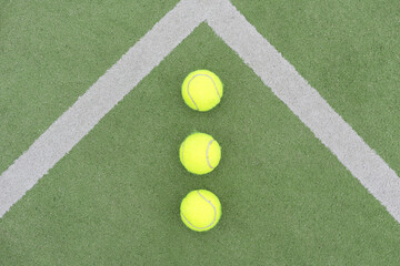 Tennis ball on green grass
