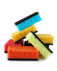 Several household sponges isolated on a white background. Stack of sponges for washing dishes.