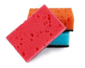 Multi-colored household sponges isolated on a white background.
