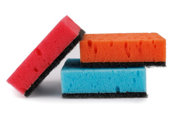 Multi-colored household sponges isolated on a white background.