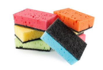 Several colored dishwashing sponges isolated on a white background.