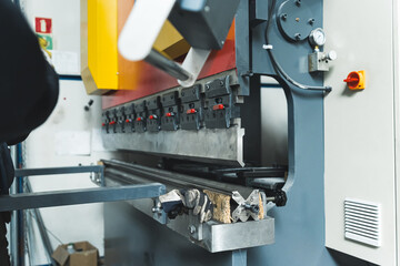 closeup view of the machine at the workshop, modern technique for guitar production. High quality photo